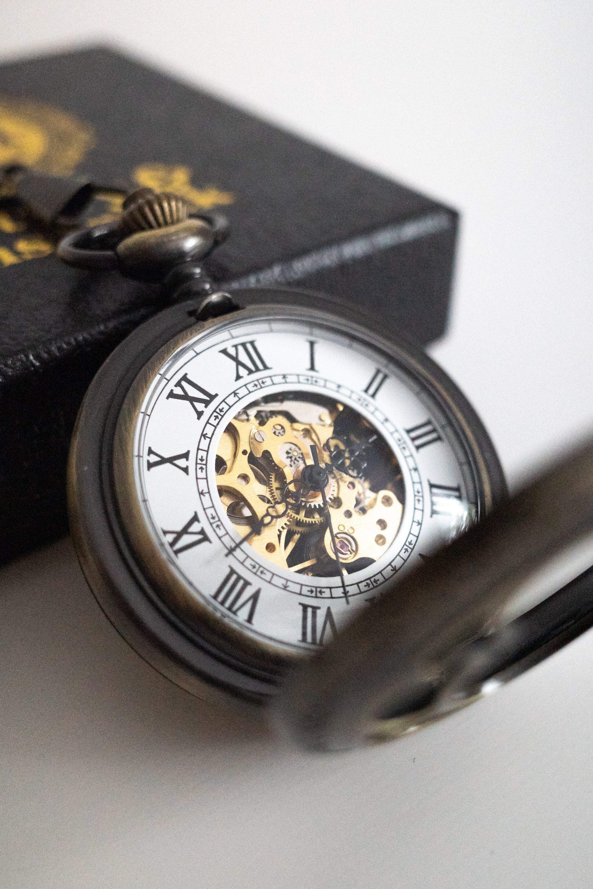 Pocket watch with online gears showing